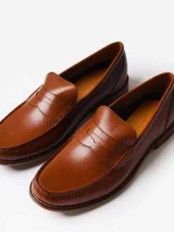 Cole Haan Men's Pinch Grand Casual Penny Loafer -Standrews Links Officials Store C37104xBRITISHTANxPrimary 77134525